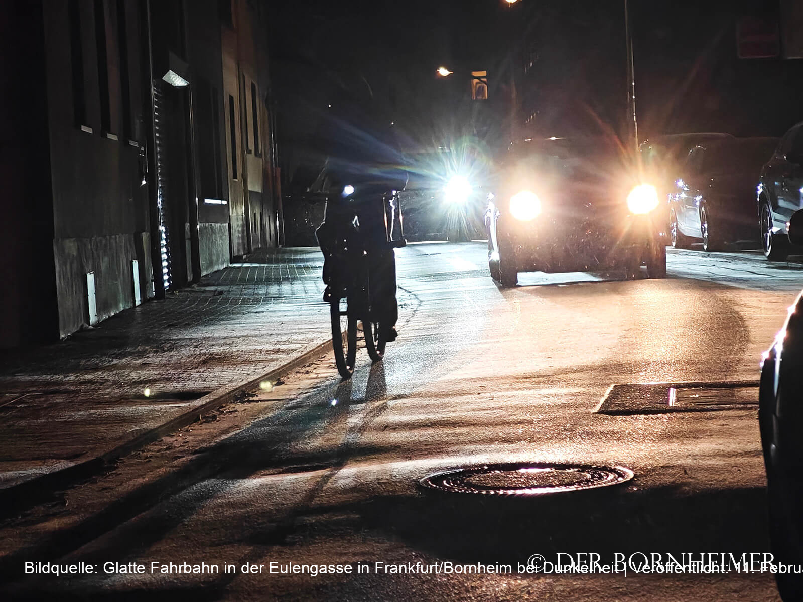 Glatte Fahrbahn in der Eulengasse in Frankfurt/Bornheim bei Dunkelheit